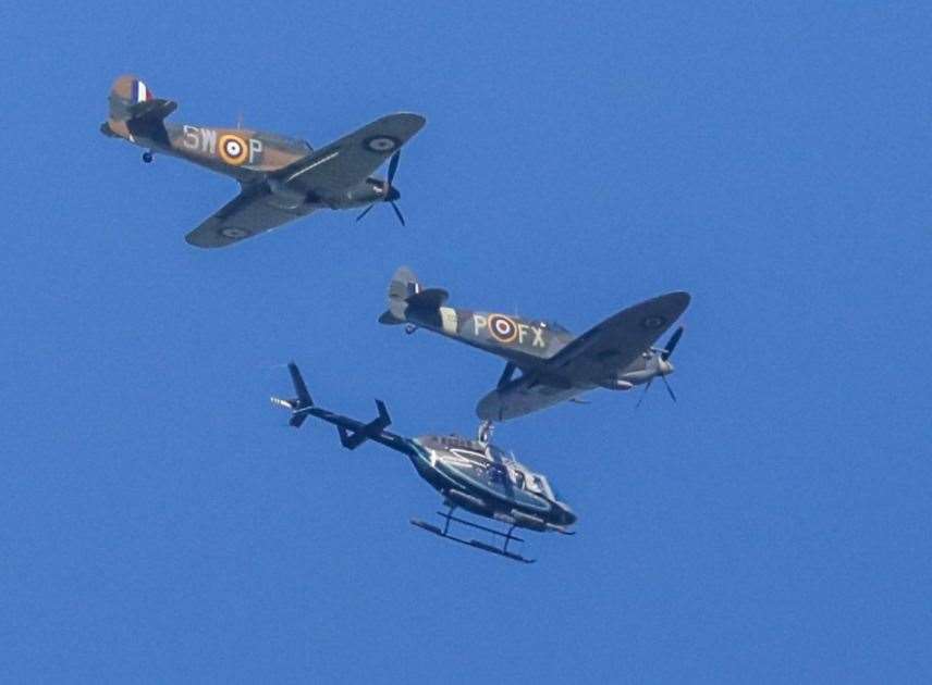 The Second World War planes and a helicopter flew over Bearsted Green out of Headcorn Aerodrome. Picture: UKNIP