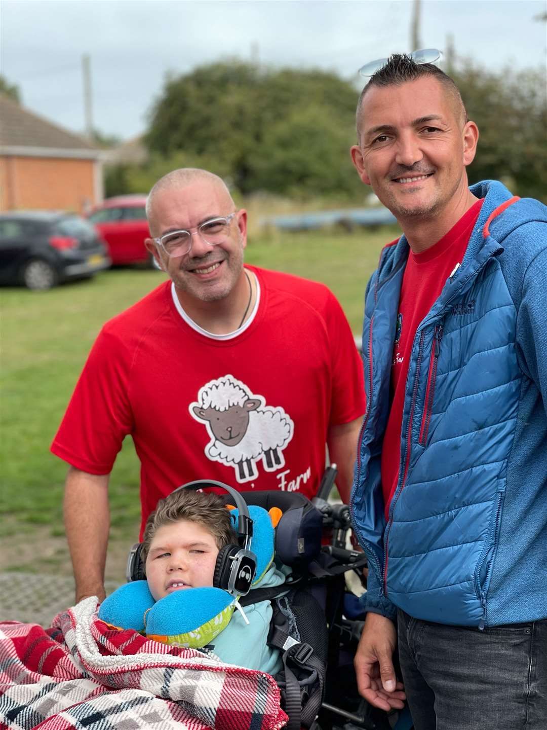 Dads Garry, left, and Kyle Ratcliffe celebrate the third anniversary of Curly's Farm at Bayview, Sheppey, with their son 'Curly' Curtis