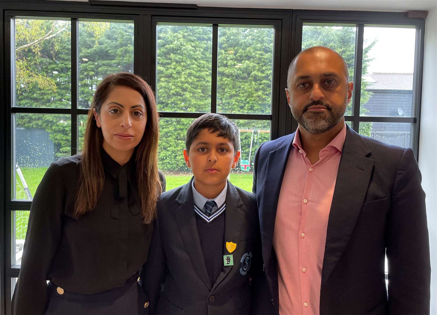From left: Mum Raj Binder, son Joshua Shergill and dad Mandip Shergill of Church Road, Hartley, were left unhappy after Joshua did not land a place at a grammar school despite being eligible