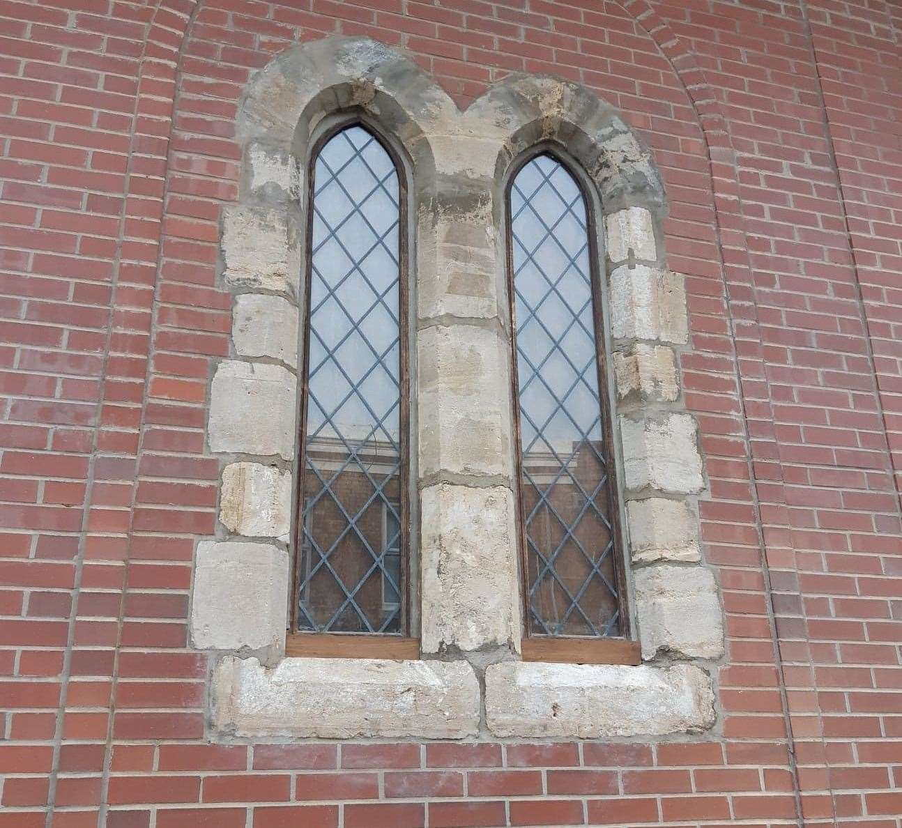 Historic glass windows from when the site was a convent have been retained at Aldi in Deal
