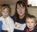 DEJECTED: Carolyn Warner and her children Aaron and Keiran. Picture: JOHN WARDLEY