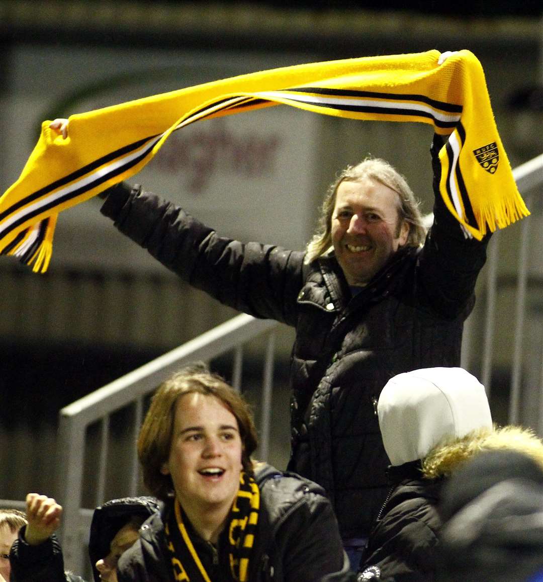 The good times are back at Maidstone as fans celebrate the FA Cup win over Torquay Picture: Sean Aidan