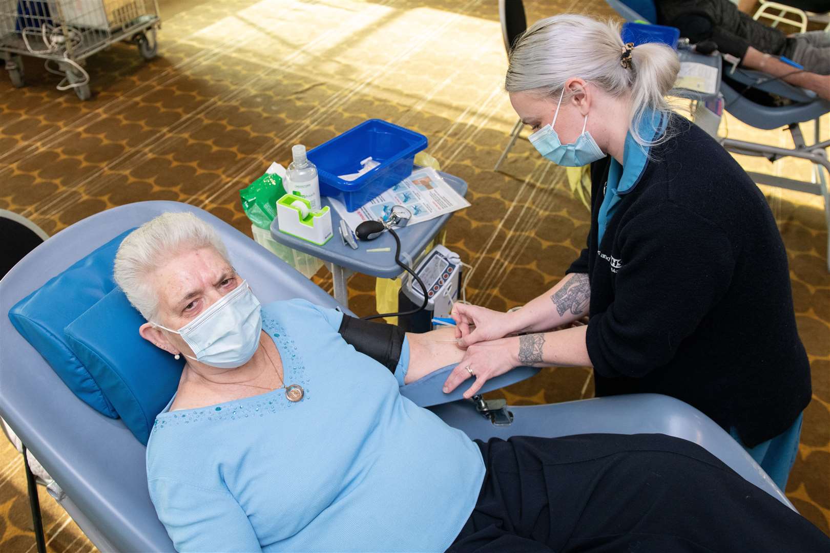 Christine Newnham giving blood at the Coniston in Sittingbourne. Picture: SWNS