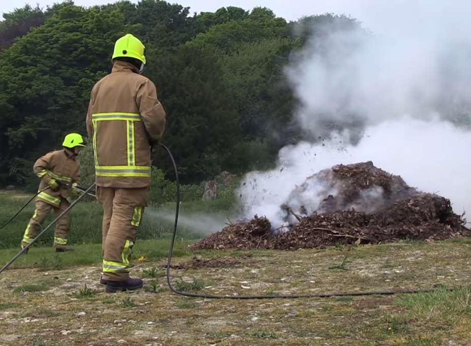 Firefighters tackle a grass fire. Picture: Kent Fire and Rescue