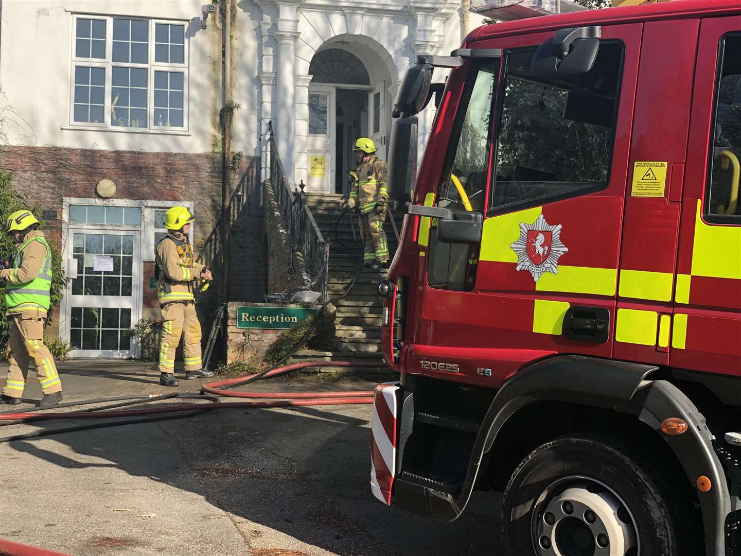 Firefighters arrive at the 'burning' school as part of their training (7293019)