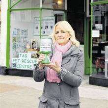 Debbie Sykes outside the TAG Pet Rescue shop in Cliftonville with one of the collection cans emptied by theives