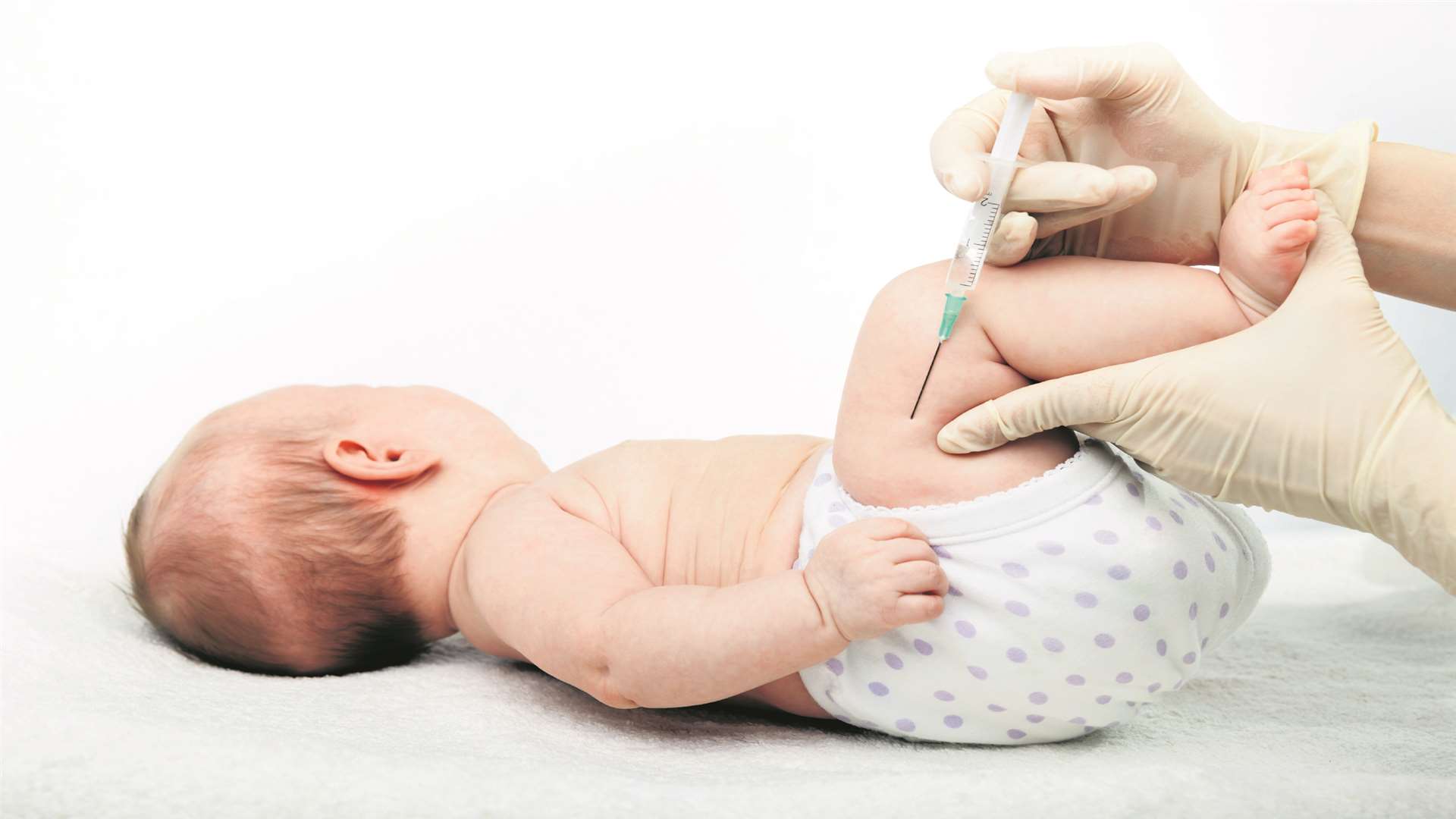 A jab being administered. Stock image