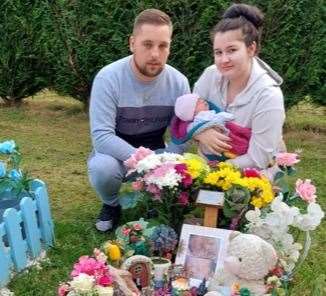 Maidstone couple David Matthews and Elena Sala with their daughter Lola at Rosanna's grave