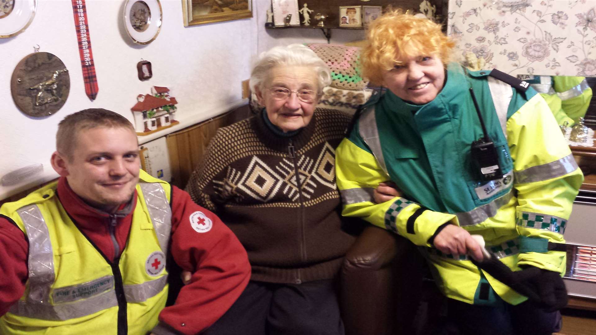 Plucky pensioner Jeanne Tapley, 86, gets a welfare visit from Russell Taylor from the Red Cross and Mary Starrs from the St John Ambulance
