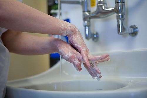 Good hand washing using soap and warm water can help stop the spread. Image: Stock photo.