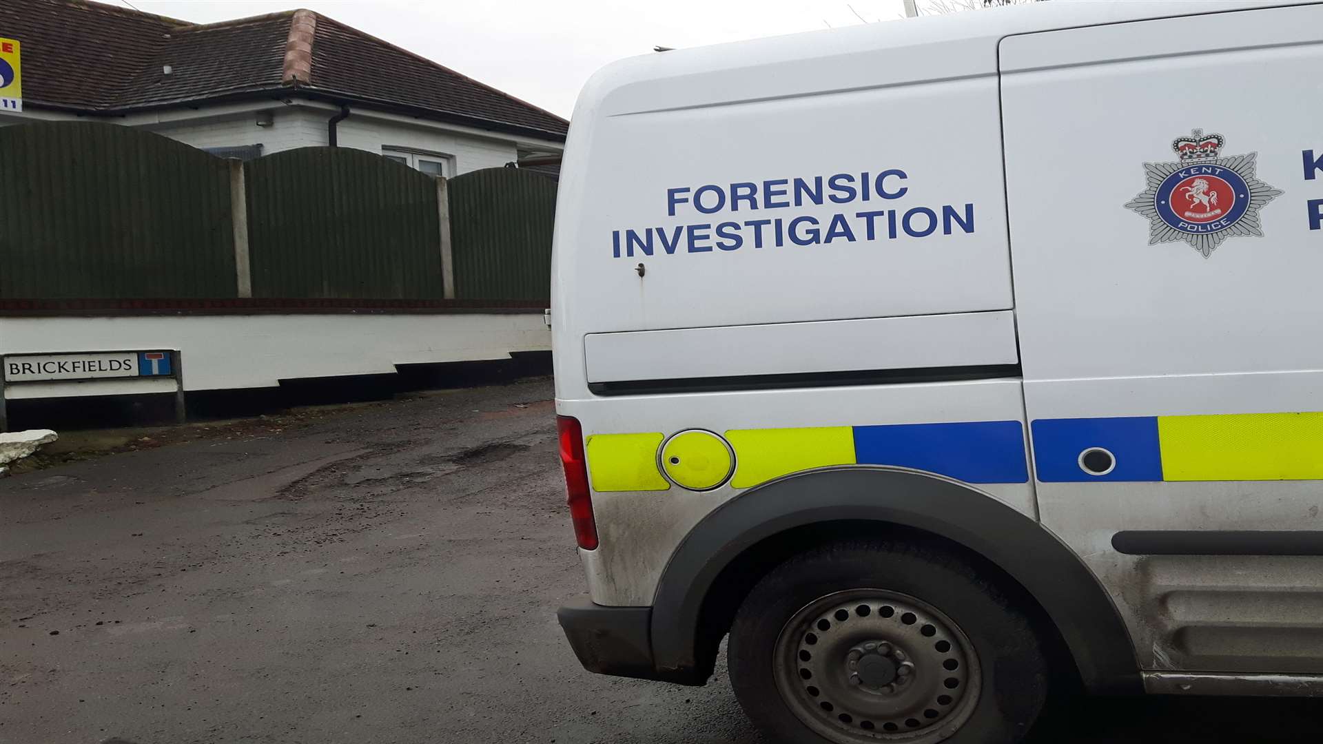 Forensic vans were sent to the scene. Stock image
