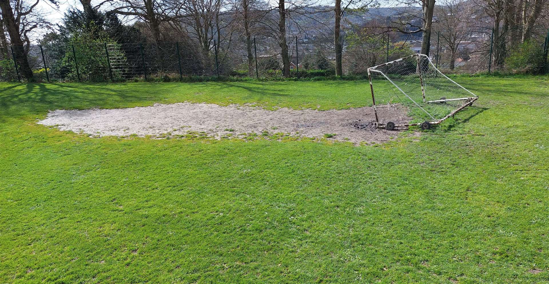 The football pitch opposite the courts is also in a poor state
