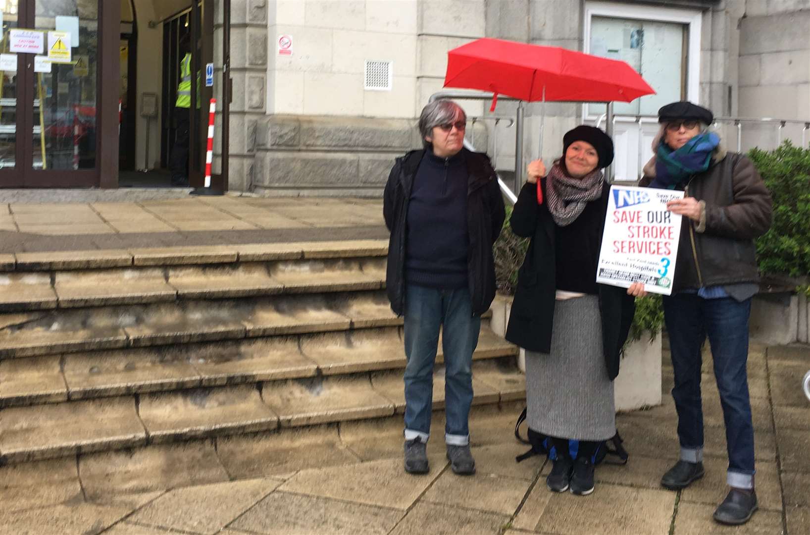 Carly Jeffrey (centre) joined by fellow Save Our NHS Kent campaigners outside County Hall, Maidstone (7509542)