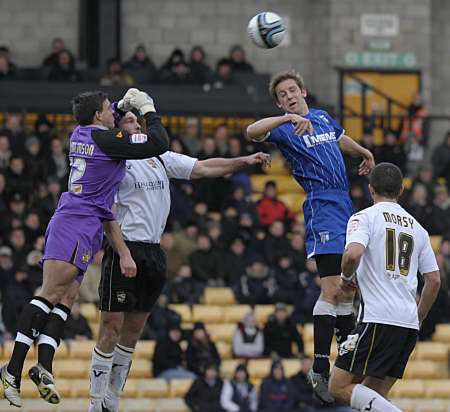 Connor Essam goes up for a header against Port Vale