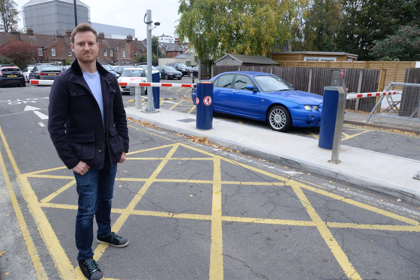 Cllr Ben-Fitter Harding and the ANPR barriers at the Pound Lane car park. Picture: Chris Davey
