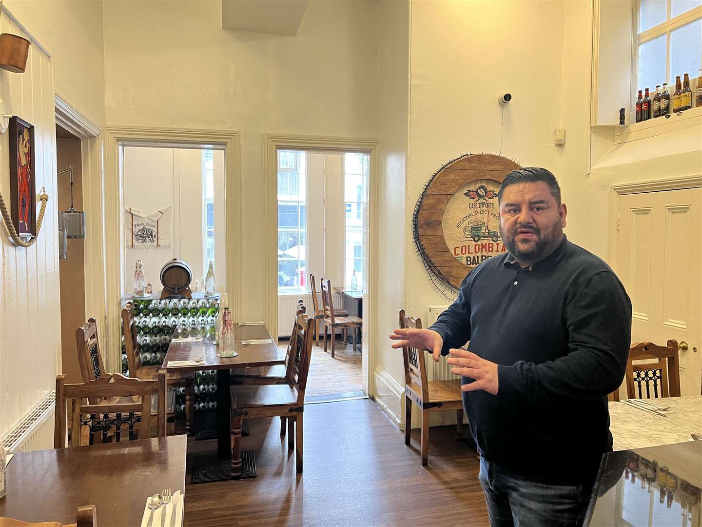Julian Ramirez in the seating area inside Rico Sabor in Gravesend. Picture: Megan Carr