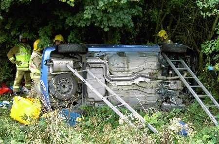 A female driver had to be cut free from her car after it overturned. Picture courtesy Kent Air Ambulance Trust