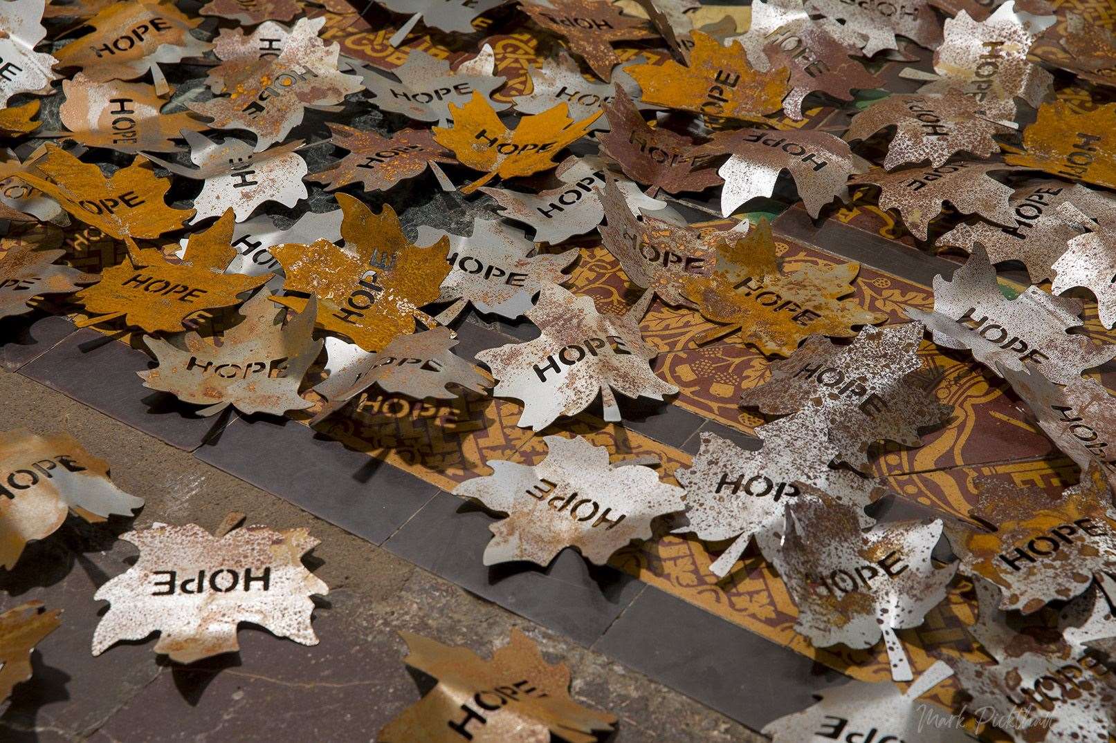 Each metal leaf is engraved with the word hope Photo: Mark Pickthall
