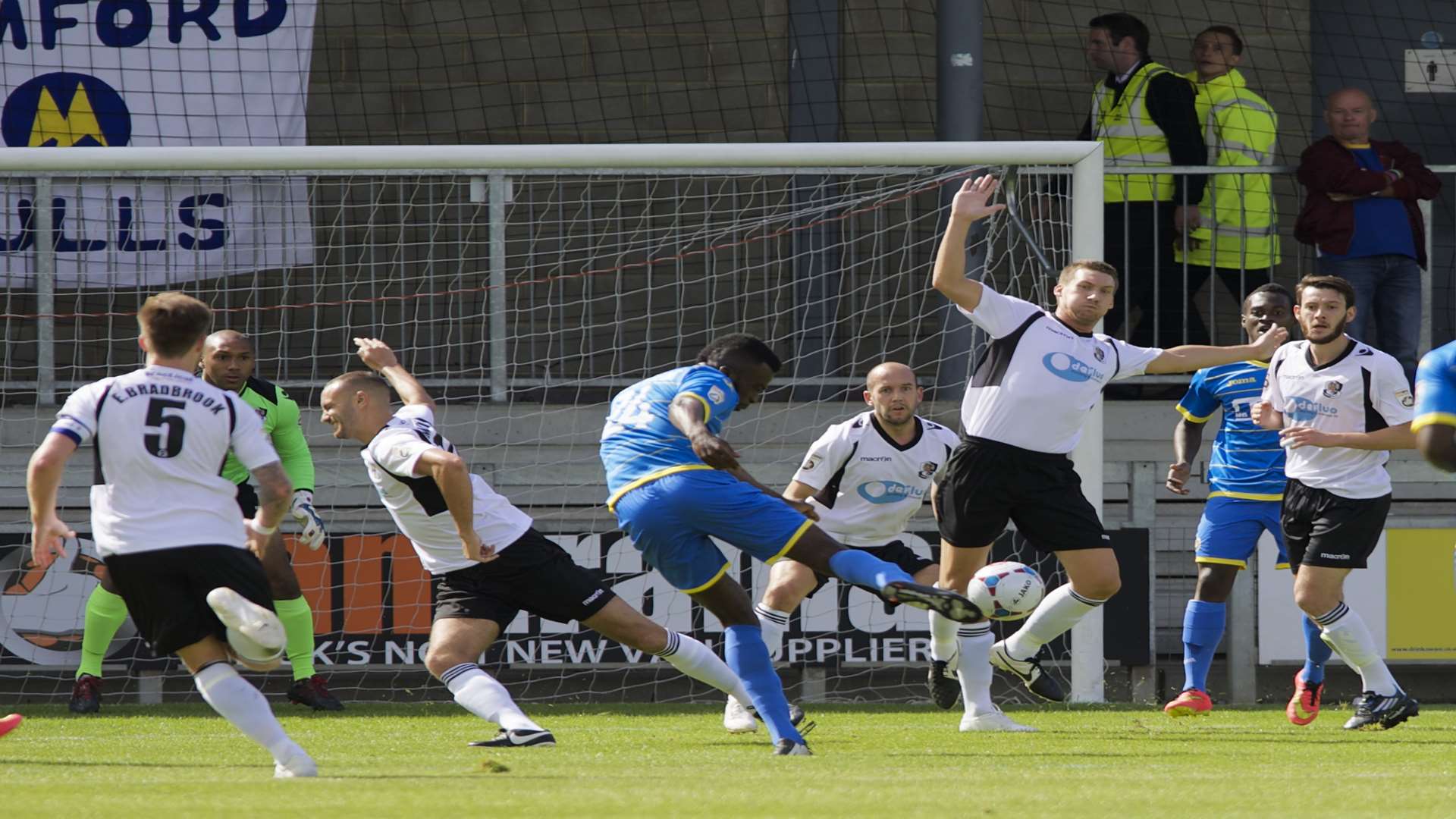 Dartford do their best to block this strike from Torquay's Duane Ofori-Acheampong Picture: Andy Payton