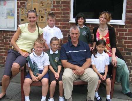 The multi-cultural St Stephen's Junior School: back, from left, teacher Helena Simkova from the Czech Republic, Tomi David from Hungary, Mary Harutiunian from Armenia, teacher Eva Chrobakova from the Czech Republic; front, from left, Jan Kurlapski from Poland, Ioana Kovac from Romania, head teacher Stuart Pywell and Gabriela Vieira from Brazil.