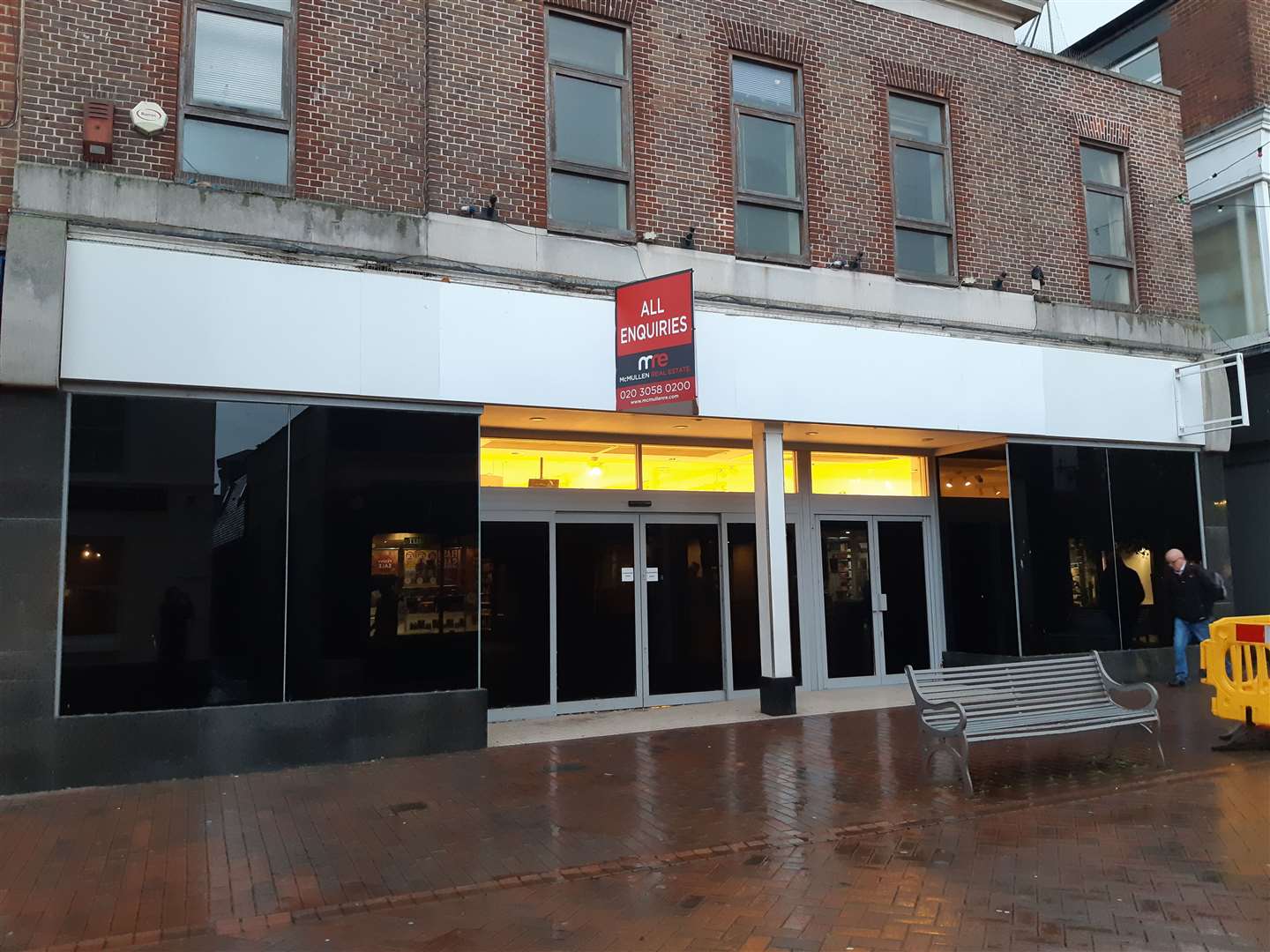 An estate agents board has gone up and the lights are on at Deal's former M&S