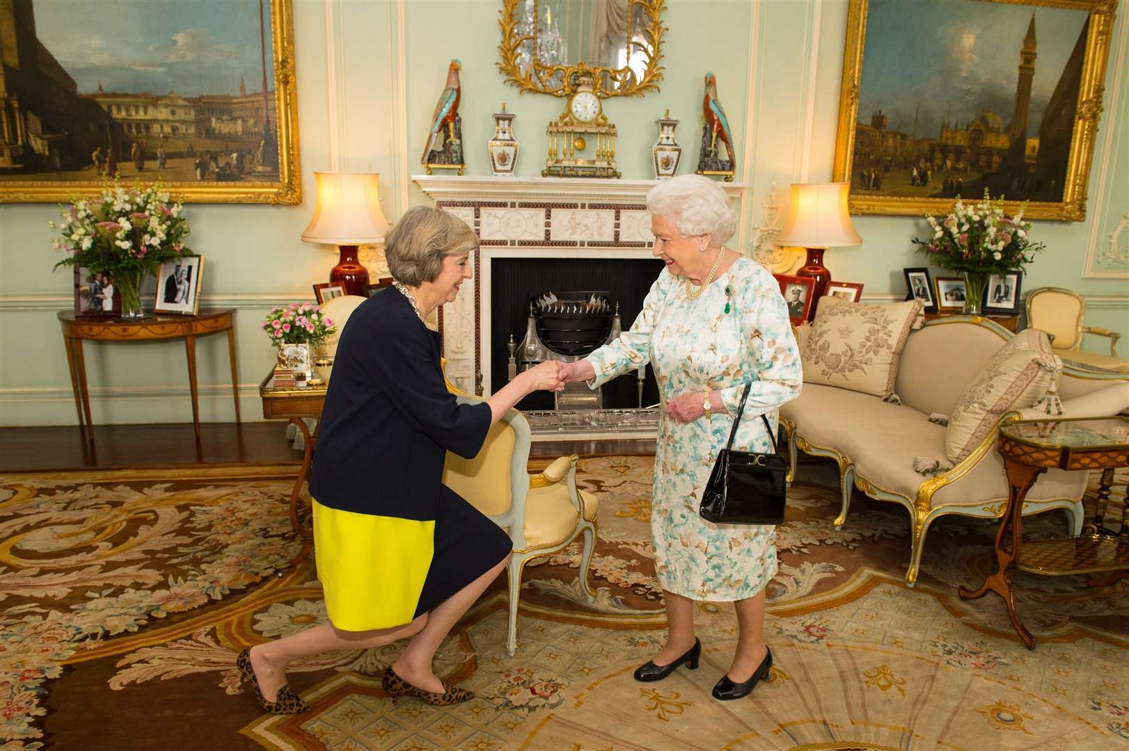 The Queen welcomes Theresa May at an audience in Buckingham Palace where she invited the former home secretary to become prime minister in 2016 (Dominic Lipinski/PA)