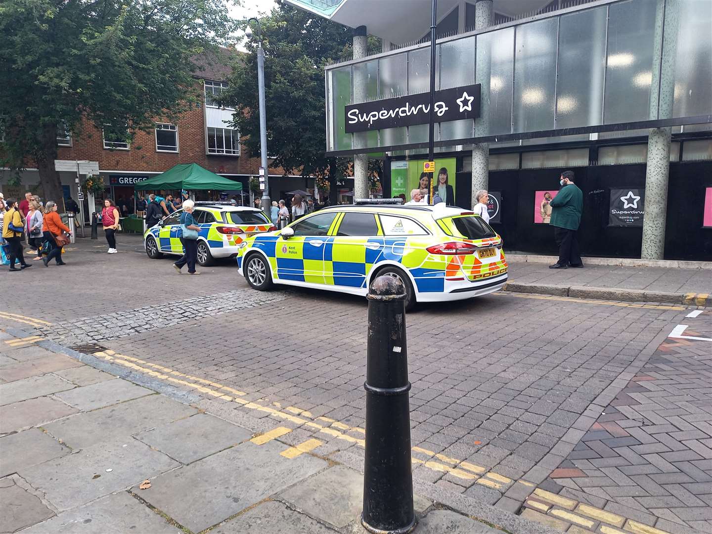 Police stationed in Canterbury Lane, outside Superdrug