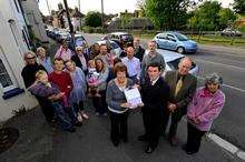 MP Hugh Robertson receives the petition from angry Canterbury Road residents