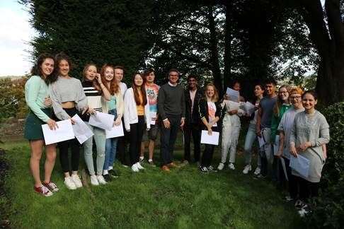 King's Rochester A-level pupils and principal Ben Charles