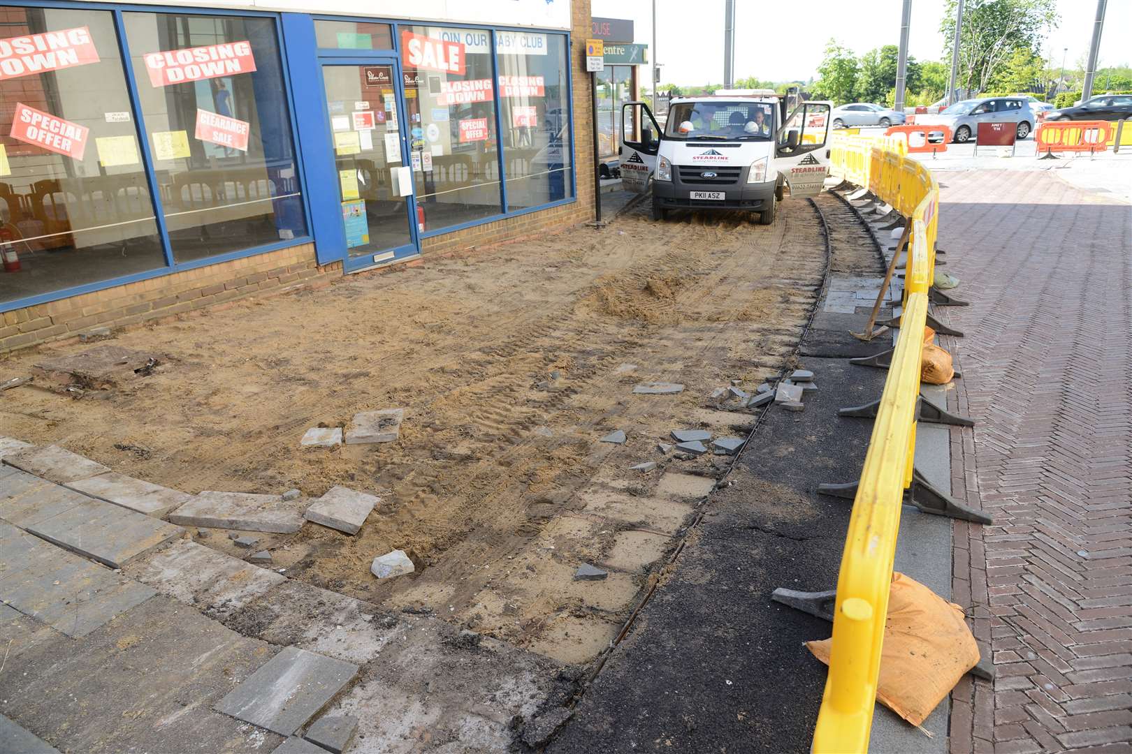 Removal of the pavement and Flume in Ashford's Bank Street is now well under way