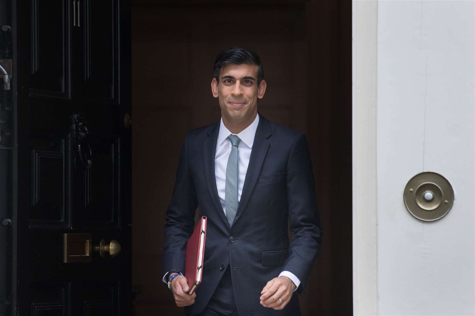 Chancellor Rishi Sunak departs 11 Downing Street to deliver a summer economic update at the Commons (Stefan Rousseau/PA)