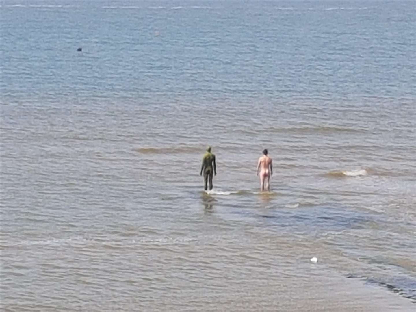 The naked man next to the Antony Gormley statue at Turner Contemporary in Margate (2244254)