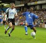 Darren Byfield tries to hold onto possession for Gillingham. Picture: BARRY GOODWIN