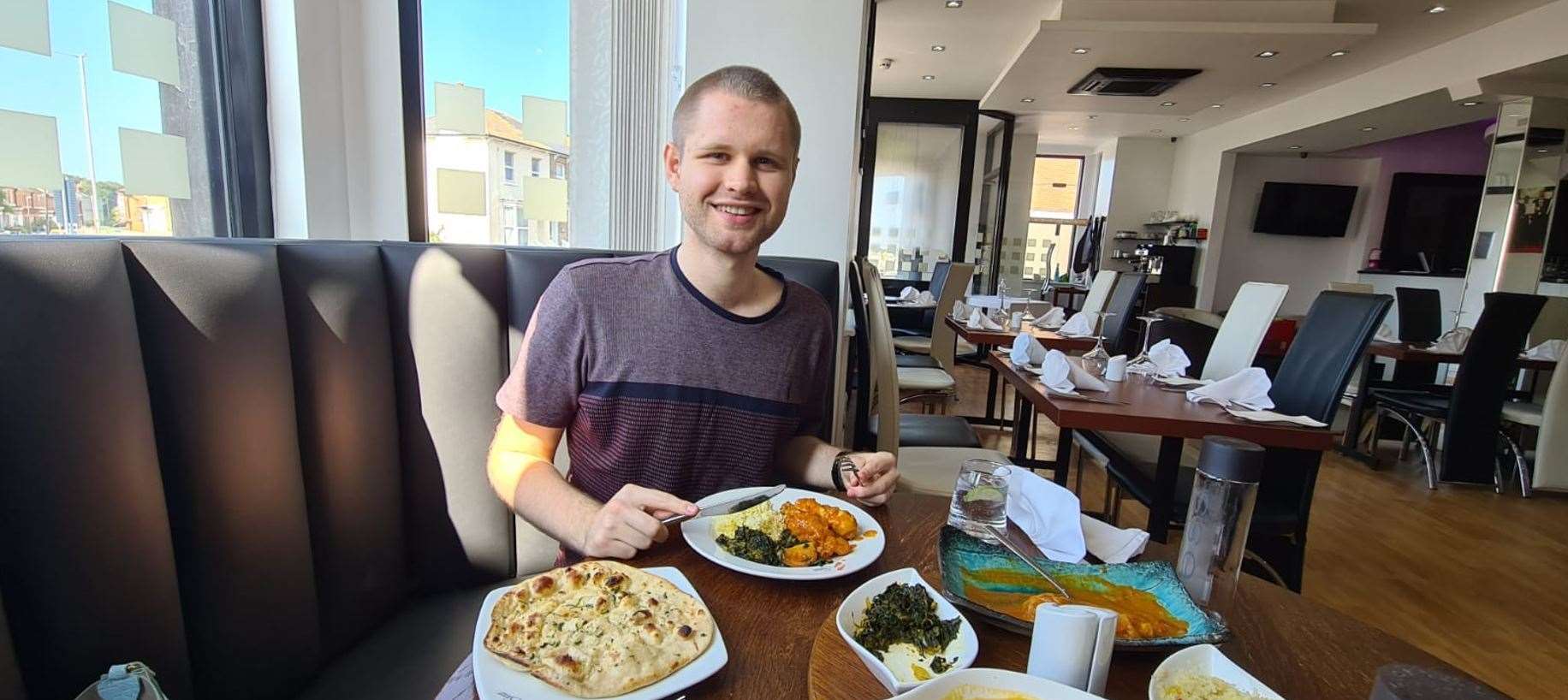 Our reporter Jack Dyson with his meal at Kent's best-rated curry house, Secret Spices in Margate