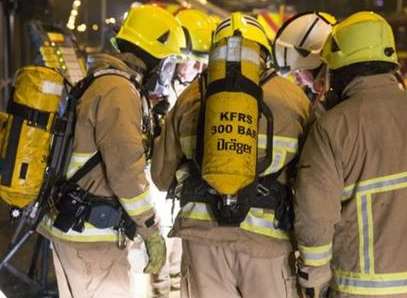 Firefighters wearing breathing apparatus. Stock Image.