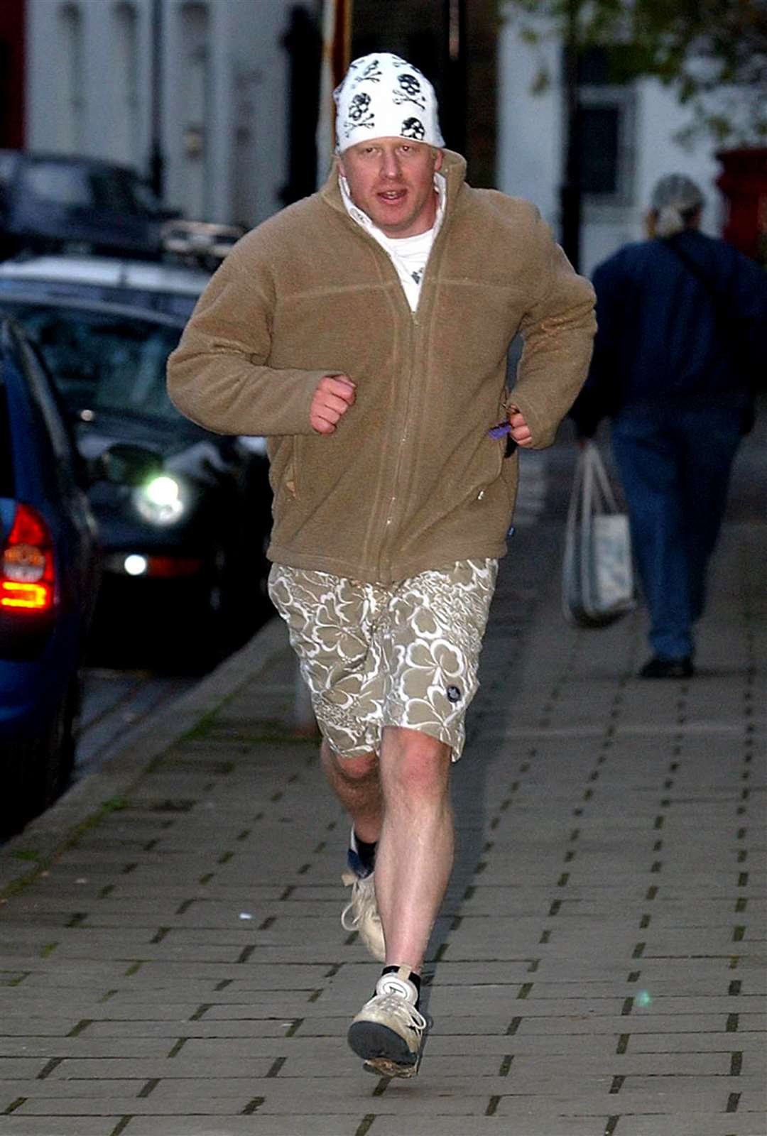 Boris Johnson on an early morning jog in 2004 after he was sacked from the shadow cabinet by Tory party leader Michael Howard, after revelations about his private life were published in a tabloid newspaper (Chris Young/PA)