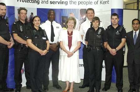 Chief Constable Mike Fuller, and Ann Barnes joined the task team for a picture at the launch at Medway Police station. Picture by Barry Crayford