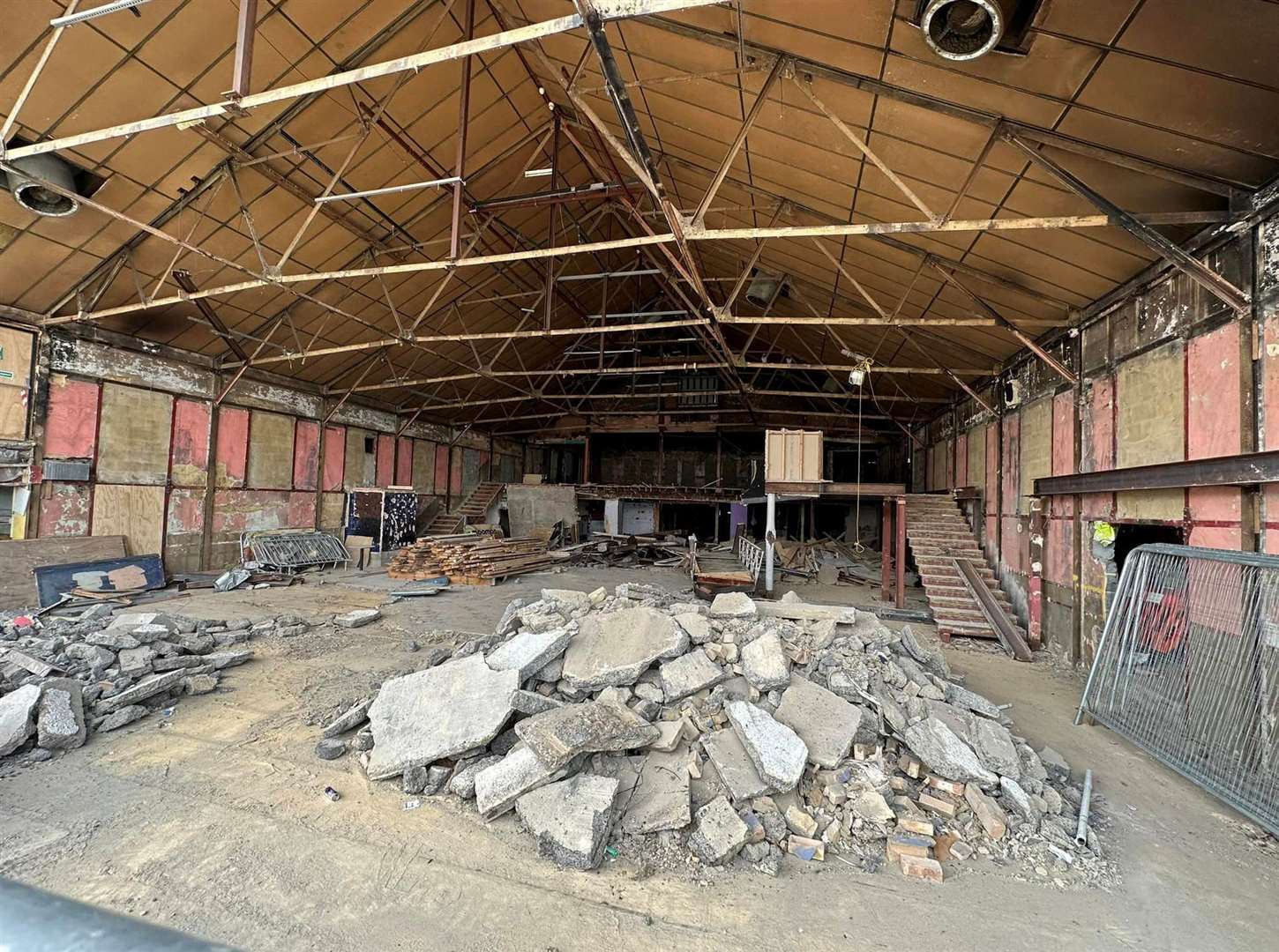 Rubble, wooden planks and debris in the stripped-out building. Picture: Glenn White