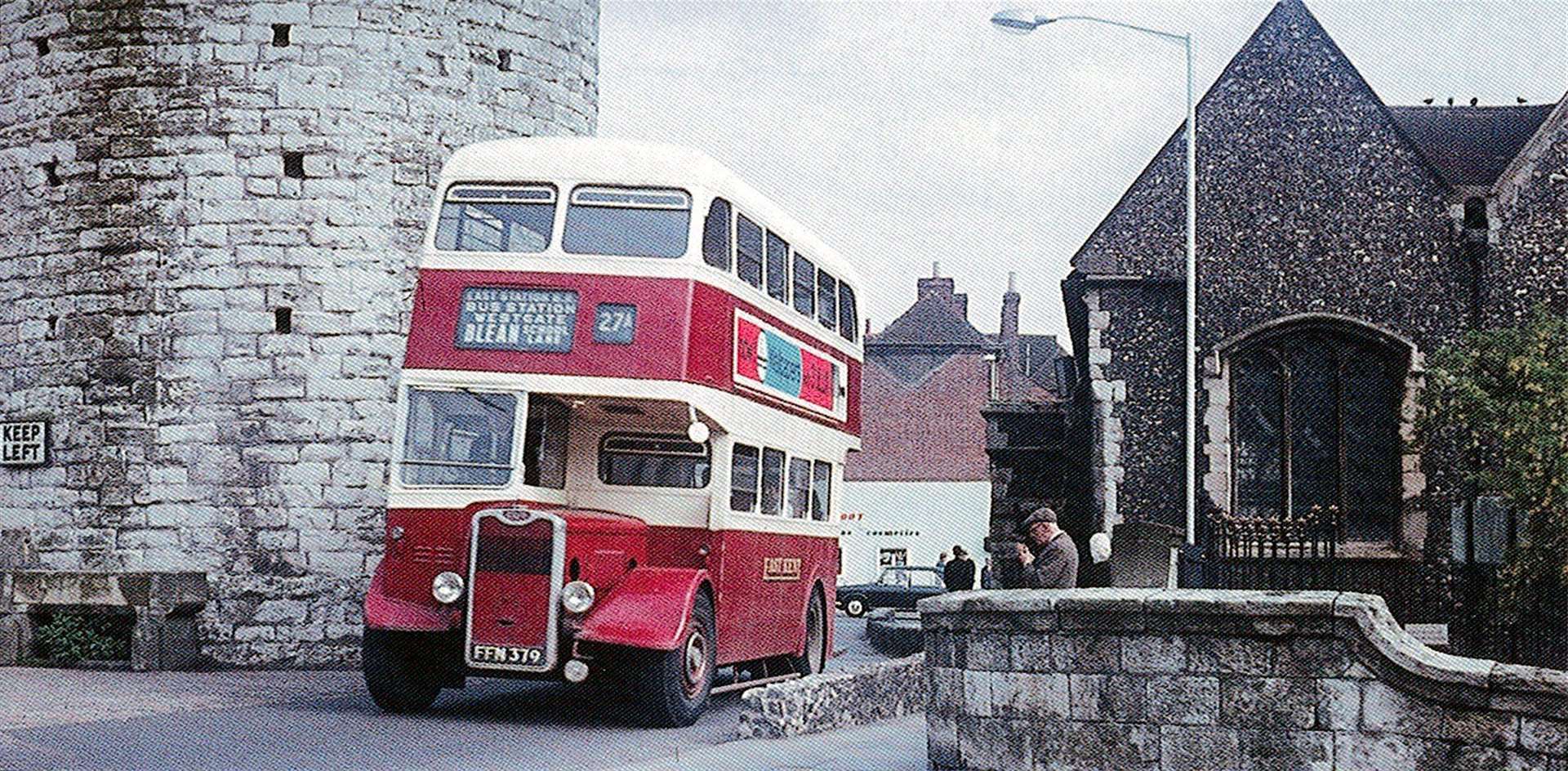 A classic Guy Arab double-decker of the East Kent Company passes through Canterbury's city wall at the Westgate in 1959. Picture: Howard Butler/Ian Allan