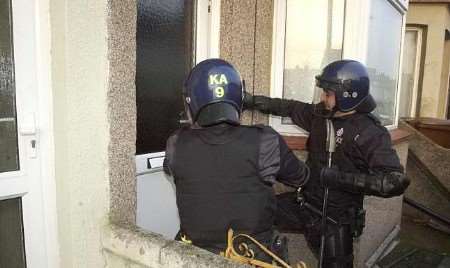 Police entering premises today in Gillingham's Seaview Road. Picture: BARRY CRAYFORD