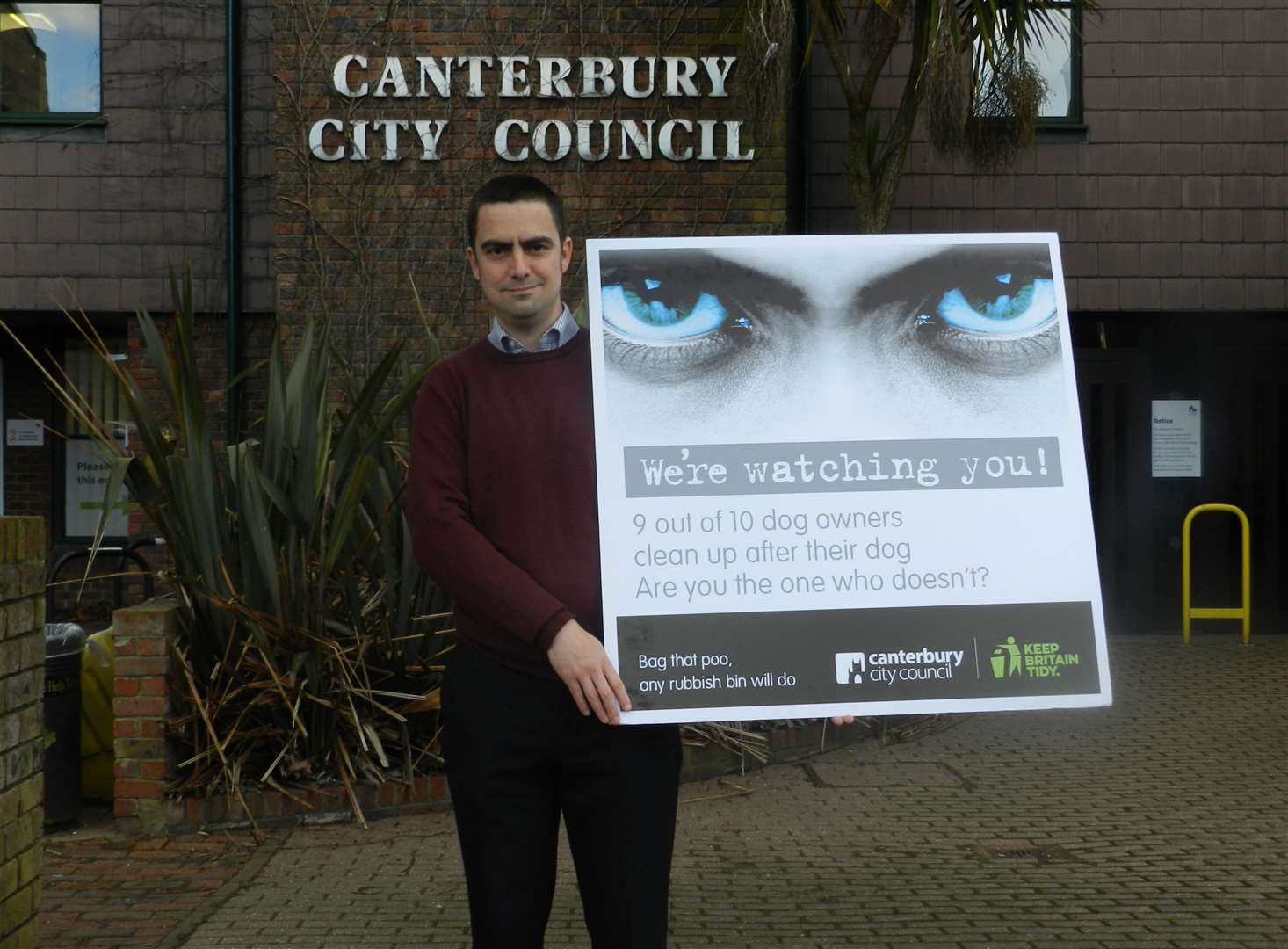 Cllr Neil Baker with one of the posters. Picture: Canterbury City Council (7793329)
