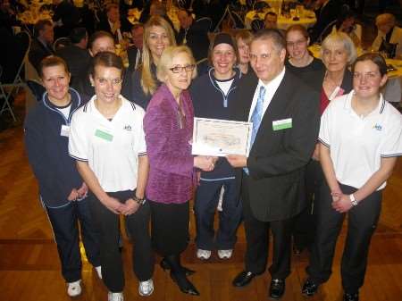 Linda Leith presents the Quality in Study Support certificate to David Harcourt and the community team from Vista Leisure