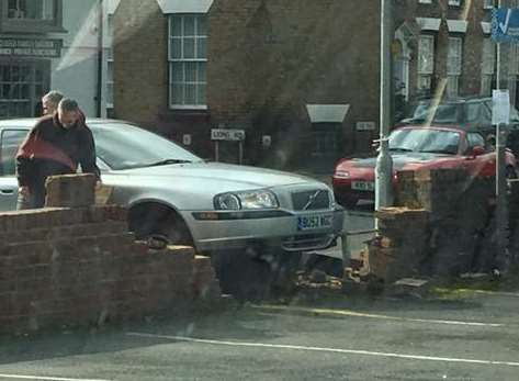 A Volvo smashed through the low car park wall in New Romney. Picture: Real Marsh Watch