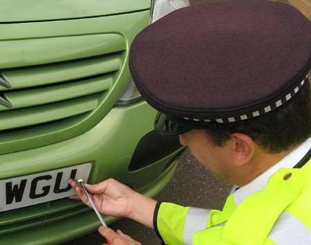 Anti-tamper screws being fitted to a vehicle. Picture courtesy KENT POLICE
