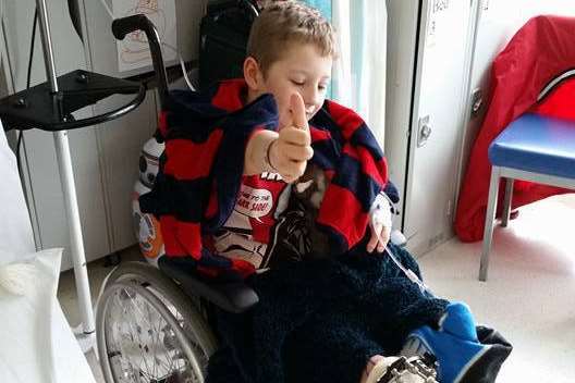 Eight-year-old Lukas Kidney has a rare disability and is undergoing surgery. He was born with bones missing, so has painful surgery to correct the problems.