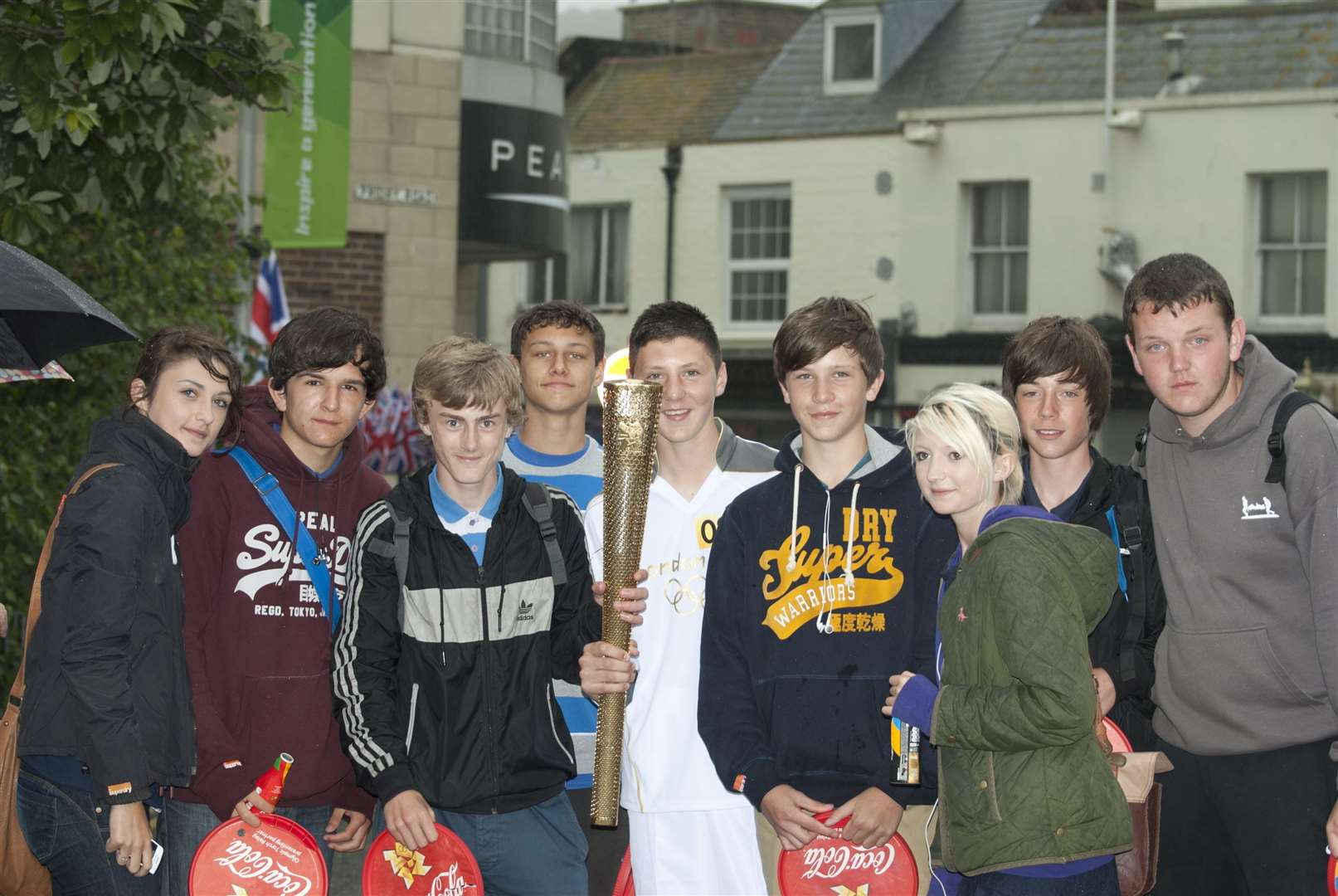 Robbie Herbert's friends from Castle Community College in Deal went to Dover to see him carry the torch. Pic: Alex Sartain