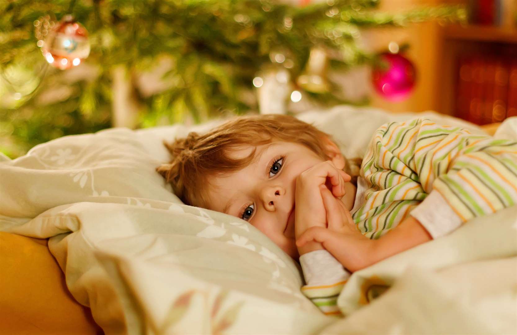 We've asked the experts how best to get the kids to sleep on Christmas Eve