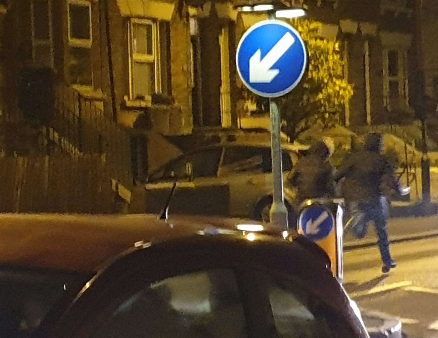Men were seen fleeing the scene of the crash in Luton Road