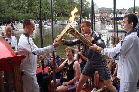 Olympic torch is handed over on the River Medway in Maidstone. Picture by John Wilson