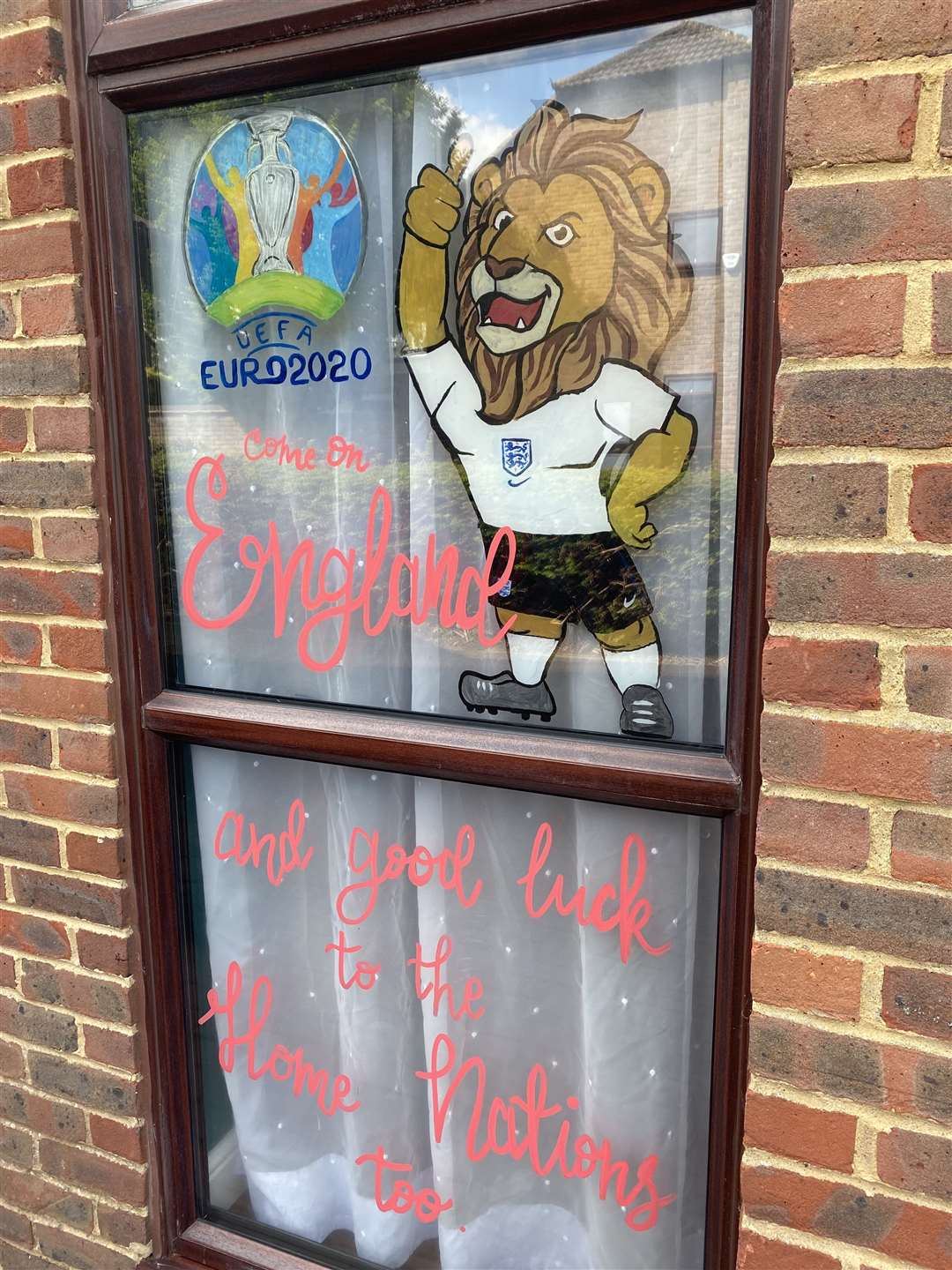 Face painter Nikki Lumbard has used her skills to decorate her window to wish England goodluck in the Euros, at her Mayfair Avenue Home in Maidstone Picture: Nikki Lumbard (48929197)